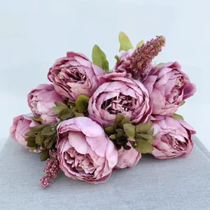 Vintage artificial peony silk flower bouquet, elegant home decor photography background.