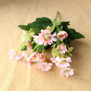 Close-up of pink artificial daisy flower bouquet, silk floral detail for DIY crafts and decor.