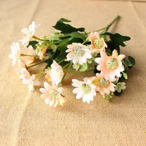 Detail shot of 6-fork artificial daisy silk flowers, perfect for home desktop decor.