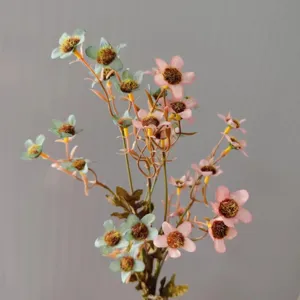 Artificial daisy flower bouquet detail view, retro style home decor floral branch.
