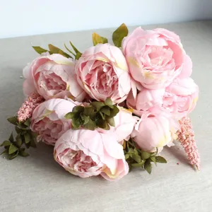 Close-up detail of 13-head artificial pink peony silk flowers bouquet for home decor photography.