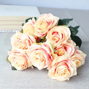 Detail view of 10-head French rose artificial bouquet, featuring soft peach silk flowers for decor.