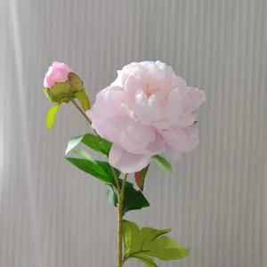 Detailed view of single branch artificial pink peony flower with two heads for home decor.