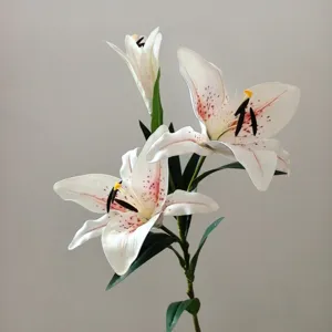 Artificial lily flower branch with realistic white petals and pink spots for decor.