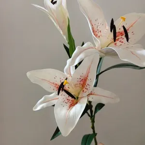 High quality PU artificial lily flower detail shot, perfect for home decor and photography.