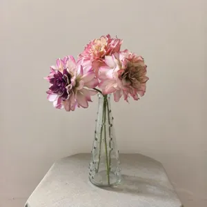 Vintage artificial dahlia flower bouquet in clear glass vase for home decor and DIY crafts.