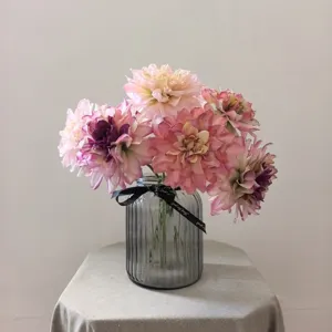 Artificial dahlia flowers bouquet in ribbed glass vase, vintage floral arrangement for home decor