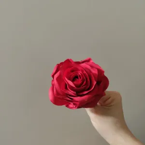 Artificial red rose flower head for craft, cake and hat decoration, silk floral accessory.