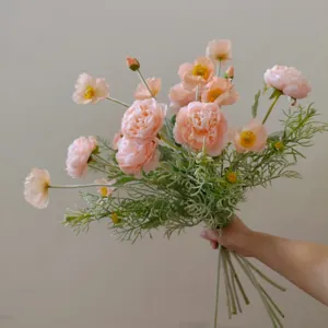 Detailed view of artificial pink flower bouquet, silk floral arrangement for home decor gift.