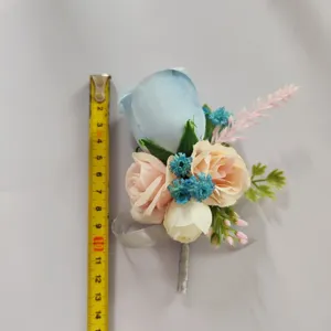 Artificial rose flower boutonniere for wedding groom groomsmen, elegant fabric design.