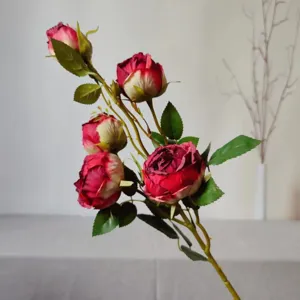 Detailed close-up of 5-head artificial vintage roses, showing delicate burnished petal texture.