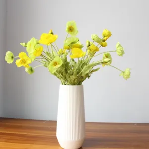 Artificial poppy flower bouquet with white ribbed vase, silk flocked floral decor for home.