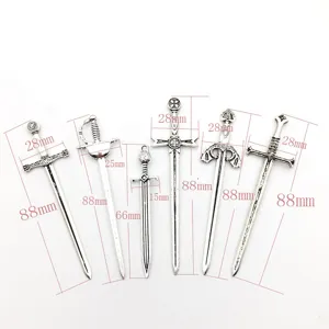 Detailed view of vintage silver alloy sword charms, perfect for DIY jewelry making and crafts.