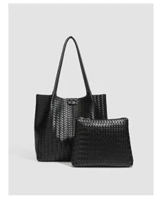 Detailed view of the black woven leather texture tote bag and matching pouch, premium design.