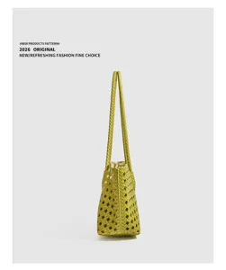 Green woven leather shoulder bag with double straps, stylish minimalist design for daily wear.