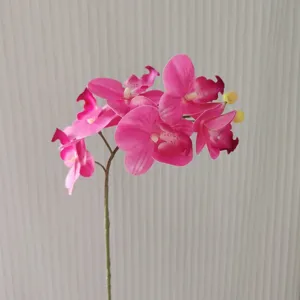 Close up of 3D touch artificial pink phalaenopsis orchid single stem detail decoration.