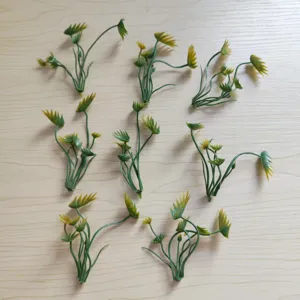 Green artificial leaf craft branches for DIY handmade corsage hat and floral arrangements.