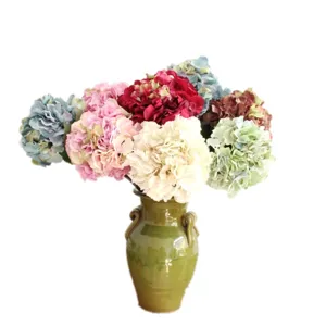 Artificial hydrangea silk flower bouquet in green ceramic vase for living room decor