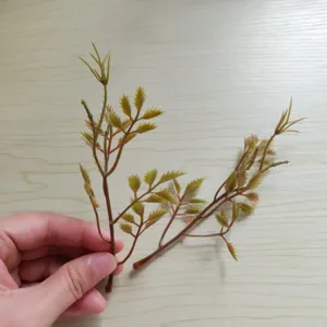 Artificial green leaves for DIY crafts, boutonnieres, hat accessories and floral arrangements.