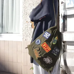 Olive green drawstring backpack, casual travel large capacity sackpack for students.
