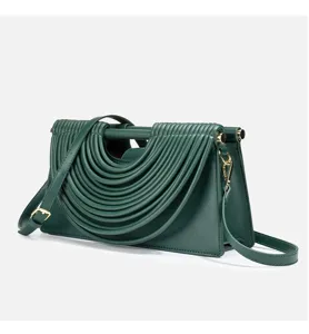 French vintage pleated noodle handbag, chic green structured crossbody bag for women.