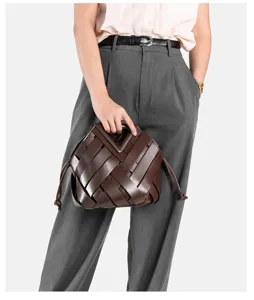 Dark brown woven leather handbag with V-handle, stylish chic shoulder crossbody bag for women.