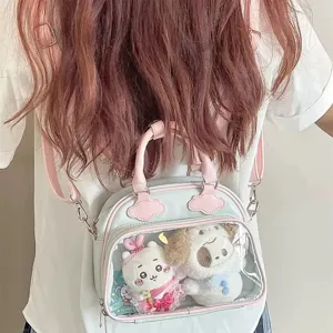 Cute pastel blue transparent ita bag with cute plush toys inside for daily fashion style.