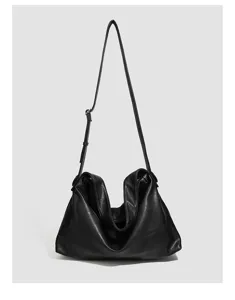 Detailed view of women's soft leather minimalist shoulder bag, large capacity crossbody.