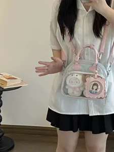 Cute transparent ita bag, blue and pink crossbody shoulder bag with clear window and plushies.