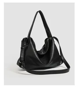 Minimalist soft leather black shoulder bag for women, large capacity stylish daily crossbody tote.