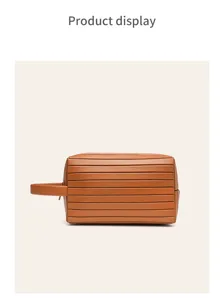 Brown horizontal striped leather toiletry bag portable travel cosmetic storage pouch.