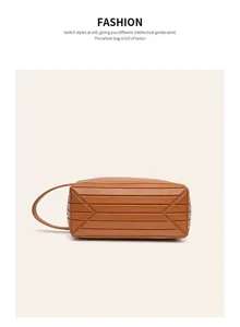 Large capacity brown cosmetic bag with geometric stripes, portable travel toiletry storage pouch.