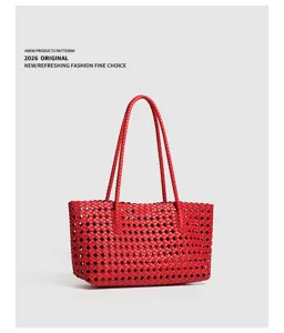 Red woven leather shoulder bag detail, stylish vintage intrecciato tote purse for women.