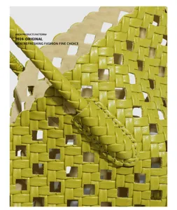 Green woven leather shoulder bag with square cutout detail, stylish casual daily handbag.