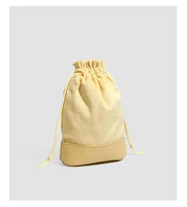 Detailed view of the soft velvet drawstring pouch, perfect for storing jewelry and small items.