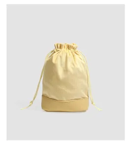 Yellow velvet drawstring pouch for jewelry storage, portable dustproof small bucket bag.