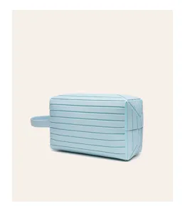 Light blue travel toiletry bag portable makeup pouch with handle and zipper design.