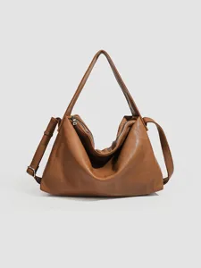 Brown soft leather shoulder bag for women, minimalist slouchy crossbody tote purse.