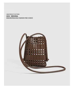 Detail shot of summer new fashion soft leather woven phone bag minimalist casual crossbody bag