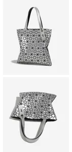 Detail view of silver geometric lattice shoulder bag showcasing unique texture and design.