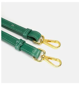 Green PU leather replacement bag strap detail with shiny gold metal lobster clasp hardware