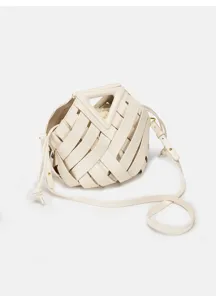 Detailed shot of a chic white woven leather handbag featuring a stylish triangular handle.