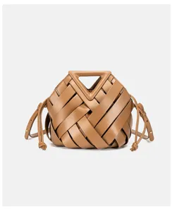 Brown woven leather handbag with triangular handle and stylish crossbody design for women.