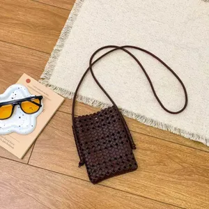 Summer fashion soft leather hollow woven crossbody phone bag, minimalist casual style.