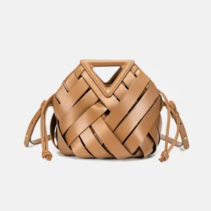 Stylish brown woven leather handbag with unique triangle handle, spacious tote design for women.