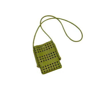 Green woven leather crossbody phone bag, casual hollow lightweight mini shoulder bag.