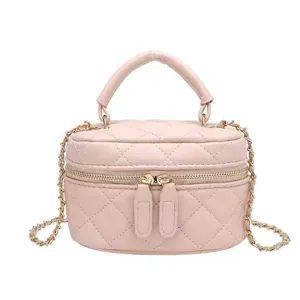 Pink quilted chain crossbody bag for women, cute mini cylinder vanity shoulder handbag.
