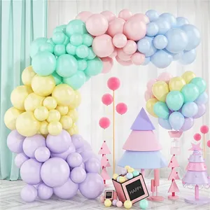 Detail of pastel balloon arch kit and party decorations for birthday wedding celebration events.