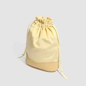Light yellow velvet drawstring jewelry pouch with leather bottom portable dustproof storage bag
