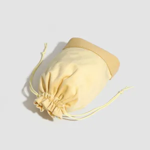 Thick velvet drawstring jewelry pouch bucket bag portable storage bag light yellow main view